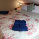 Emperor sized bed in Cornish Holiday Cottage